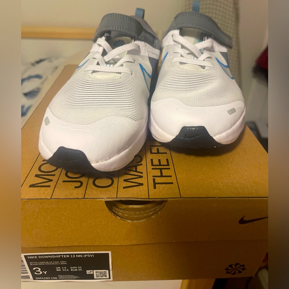 Kids Nike downshifter 12nn sneakers. NWOT. White, grey w/ blue accent swoosh.